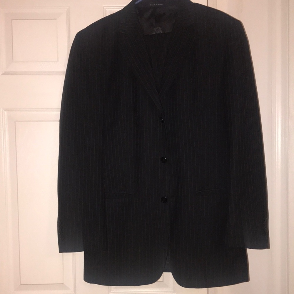 Men’s black 3 button suit w/gray pinstripe. EUC worn twice.